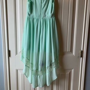 Gorgeous Turquoise High Low dress w/ lace detail.